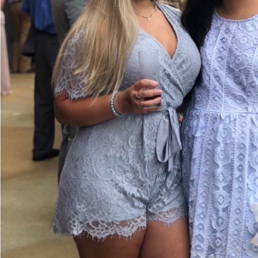 Beautiful lace romper worn once for a wedding perfect condition